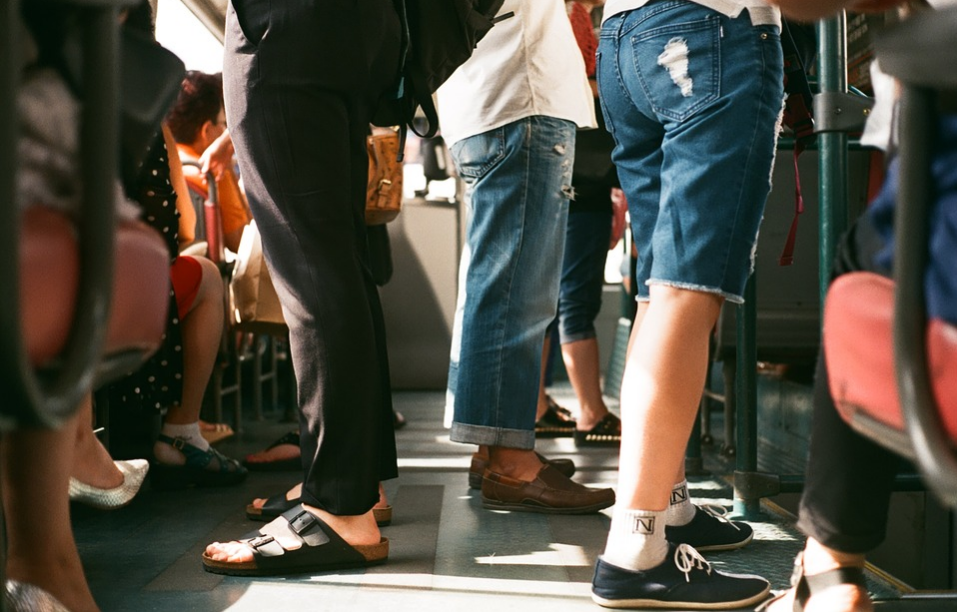 people traveling in a train
