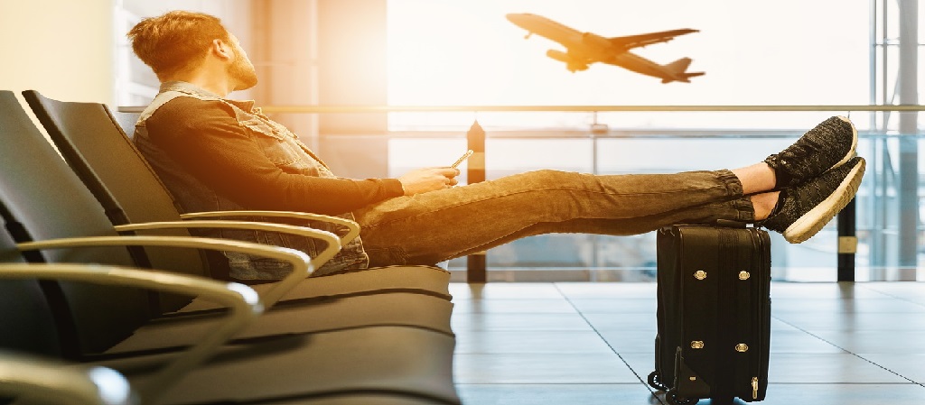 Guy sitting at the airport